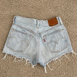 Levi’s 501 shorts, light wash, size 25.